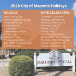 A holiday schedule for the City of Macomb in 2026 is displayed over a photo of Macomb City Hall. It lists holidays and their dates, such as New Year’s Day on January 1 and Christmas Day on December 25.